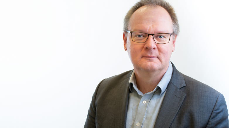 Porträtt av en man.